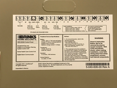 Brinks main alarm panel lid with wiring terminal label