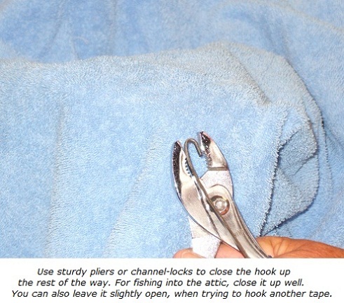 Finish forming an eye hook in fish tape