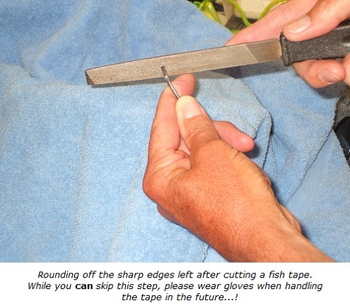 Filing sharp edges off of cut end