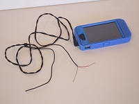 Cord plugged into iPhone as a “MacGyver” tone generator