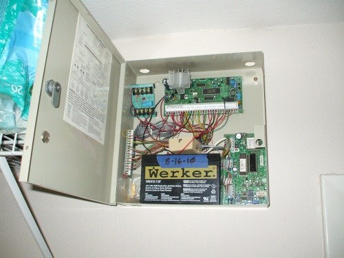 Burglar alarm battery in panel