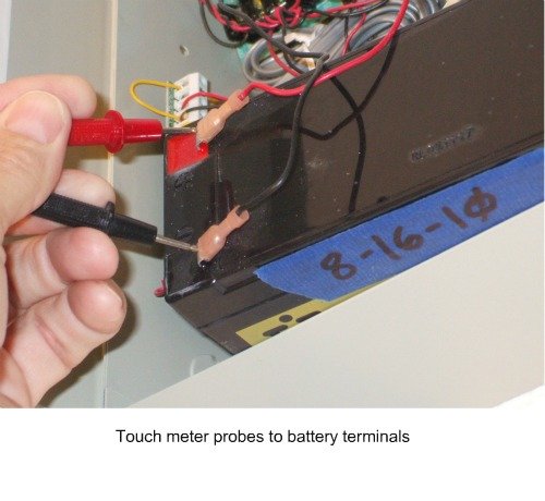 Home alarm system battery terminals