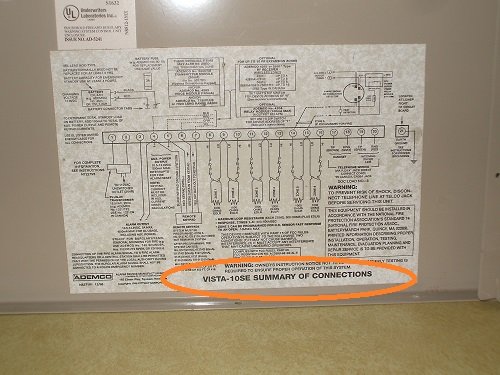 Inside of lid of Ademco Vista 10SE panel.