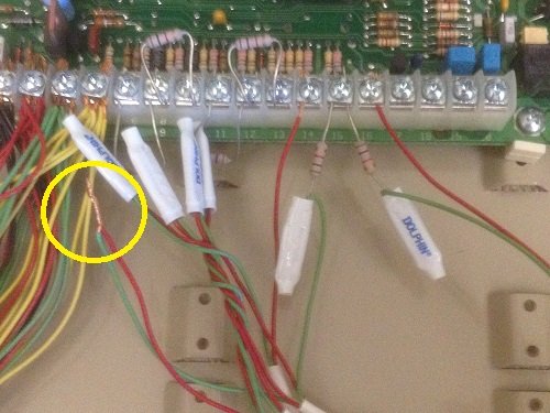 Re-soliced alarm wires connected to panel terminals