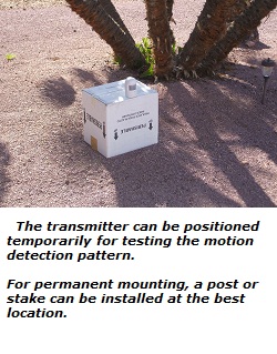 Testing transmitter for the best location, looking across driveway