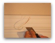 Magnetic door switch prying with putty knife