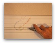 Magnetic door switch razor knife scoring caulking