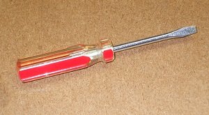 Screwdriver handle can be used to smack switches